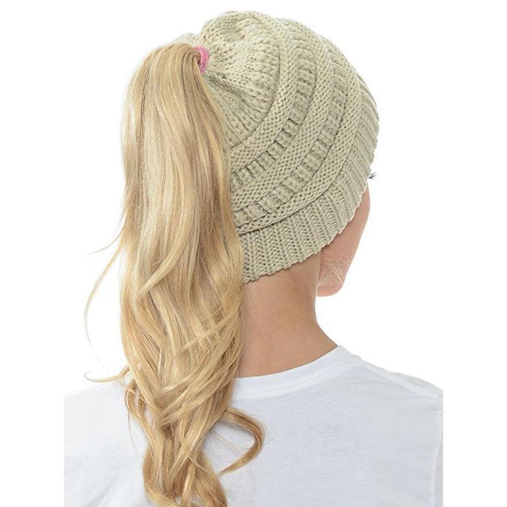 Andra - Beanie met ponytail-opening.
