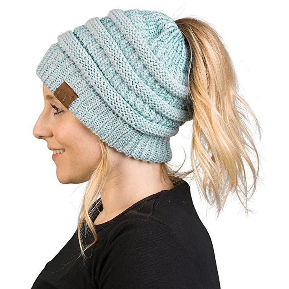 Andra - Beanie met ponytail-opening.