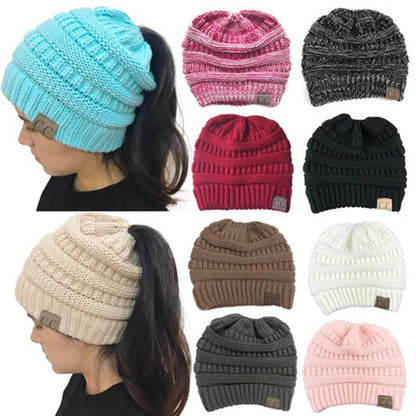 Andra - Beanie met ponytail-opening.