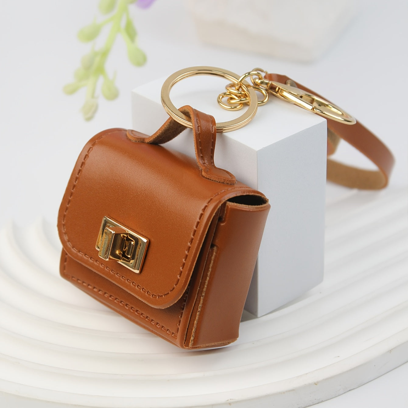 Noor - Leren Handtasje Sleutelhanger met Buckle Sluiting